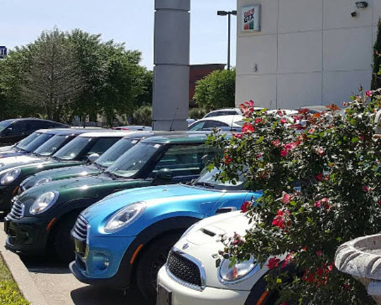 Row of MINI Cooper Cars Outside Our Garage